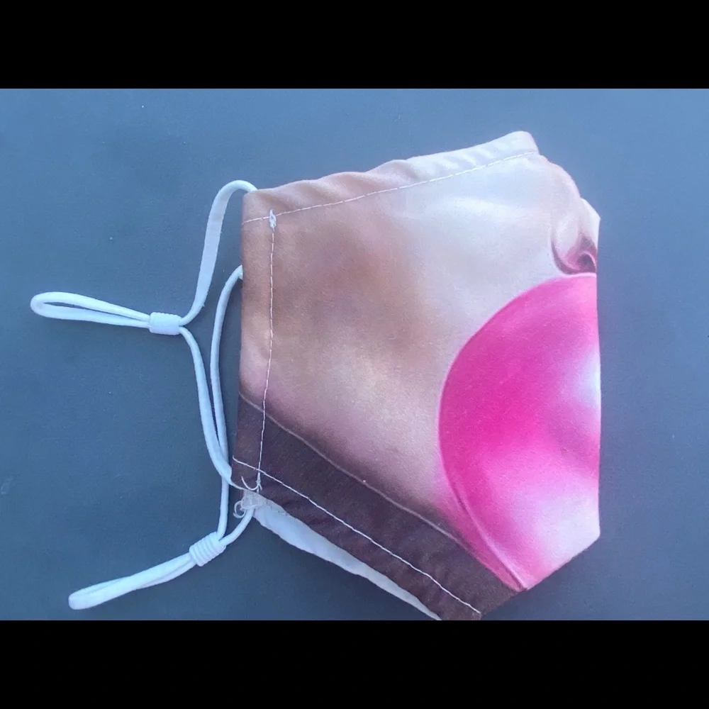 FUN mask! Has 2 NEW filters for inside pouch